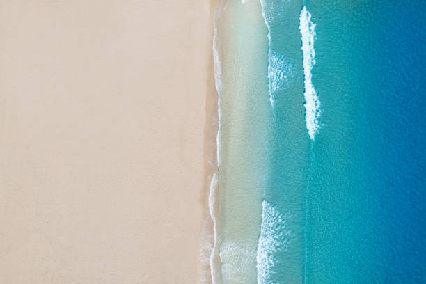 Aerial viev tropical beach in Mediterranean idyllic paradise turquoise water shore waves Aerial viev of tropical beach in Mediterranean idyllic paradise turquoise water and shore waves background waters edge stock pictures, royalty-free photos & images