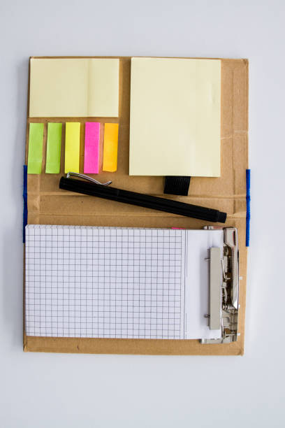 istock Top View Of Notepad And Pen On Table 1473029918