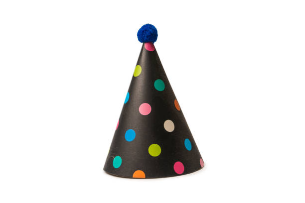 istock Bright and colorful birthday cap isolated on a white background. 1473031058