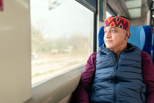 istock Happy senior man of Himachal Pradesh travelled by vande Bharat train. 1473031196