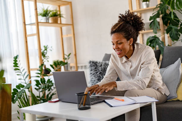 istock Young African Ethnicity Freelancer Woman Working On Laptop At Home Office. Remote Work 1473032420