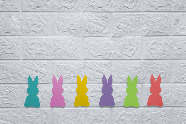 istock Creative DIY Easter Decorating Ideas. Copy space. Top view. Garland with hares for house. 1473033695