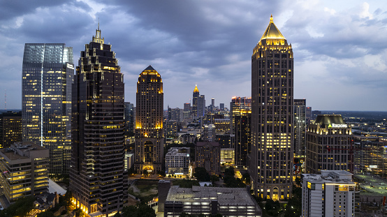 skyscrapers of Midtown Atlanta illuminated at dusk