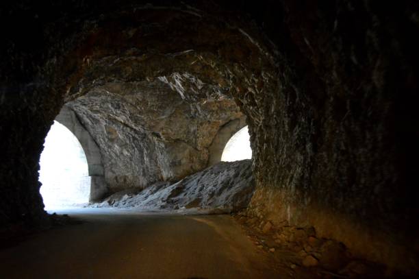 istock a tunnel cut through the mountain 1473035087