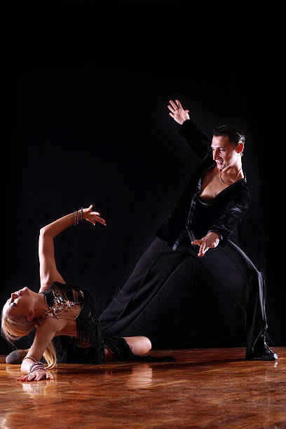 istock dancers in ballroom against black background 147303771
