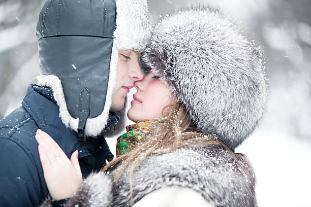 Young couple tender outdoors portrait.