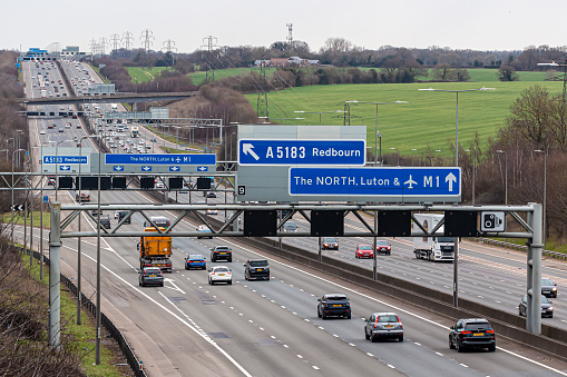 Redbourn, UK - March 11, 2023: British road transport. Afternoon traffic on busy British motorway M1