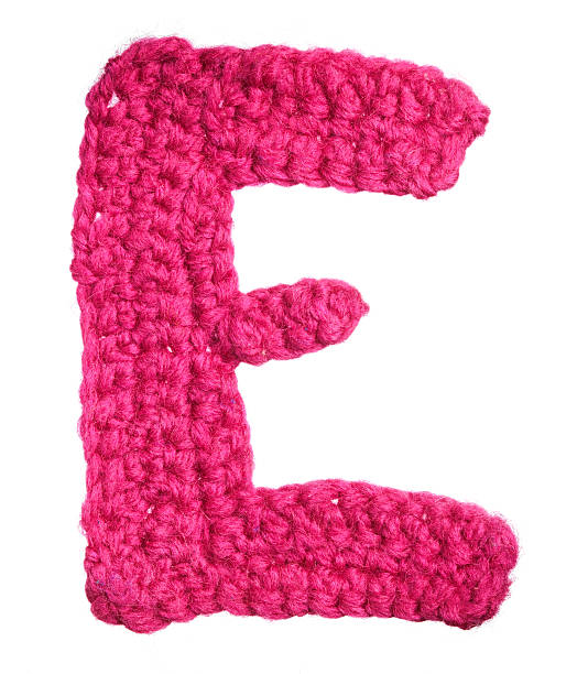 istock One isolated letter of knit handmade alphabet - E 147305575