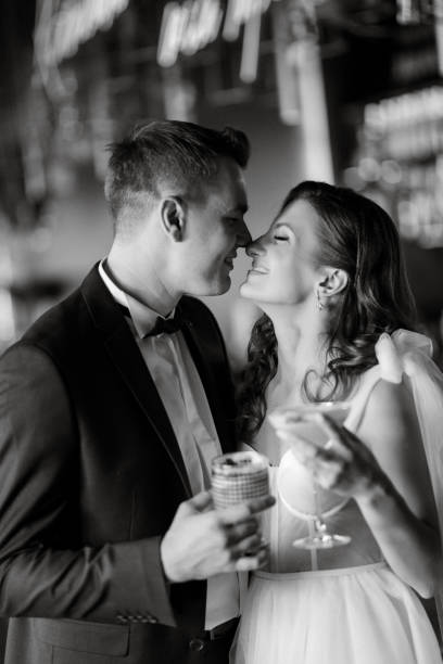 istock bride and groom inside a cocktail bar 1473058633