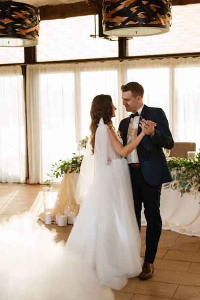 istock the first dance of the bride and groom inside a restaurant 1473059713