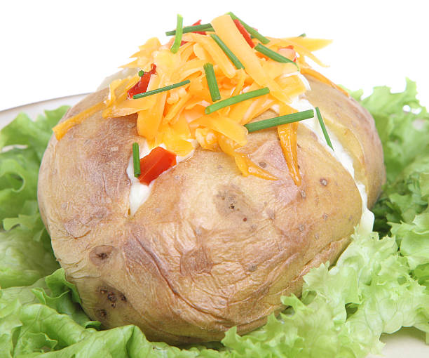 istock Baked Potato with Sour Cream and Cheese 147306156