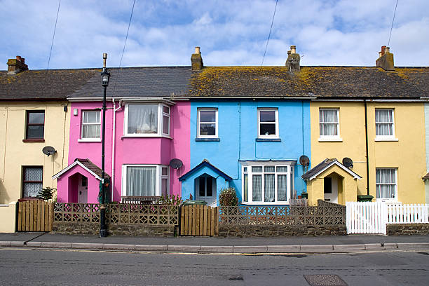 istock Row of brightly colored houses 147306531