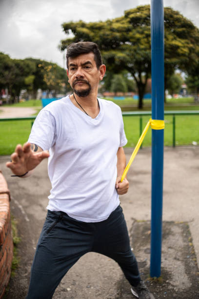 istock Mature man training on the public park 1473067550