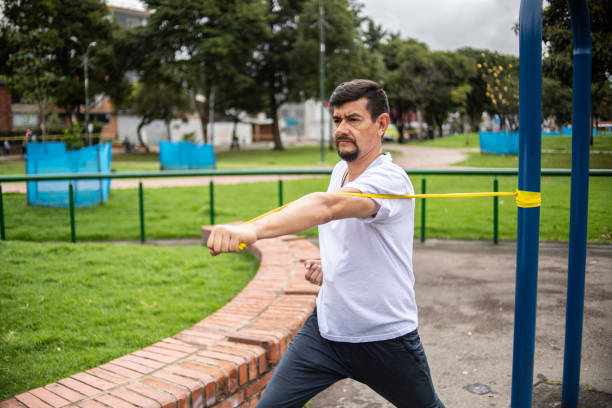 istock Mature man training on the public park 1473067554