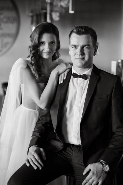 istock bride and groom inside a cocktail bar 1473068037