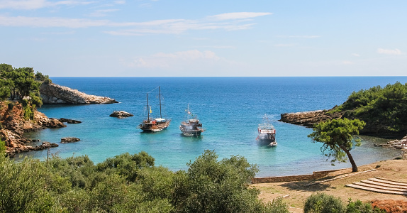 Summer vacation on tirquaz water of Aliki beach on Thasos or Thassos Greek island in the Aegean Sea.