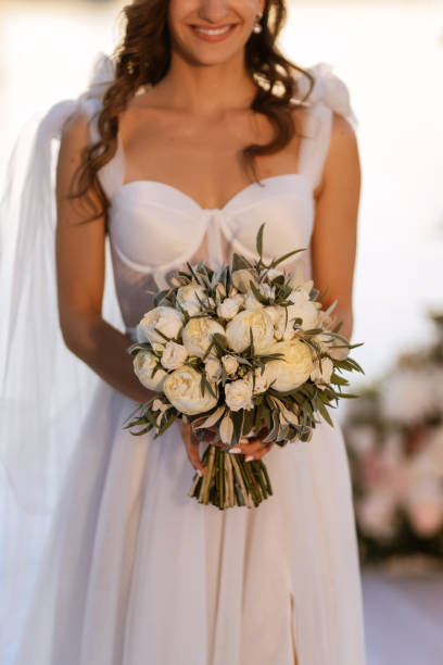 istock bride against the background of a yellow sunset 1473069323