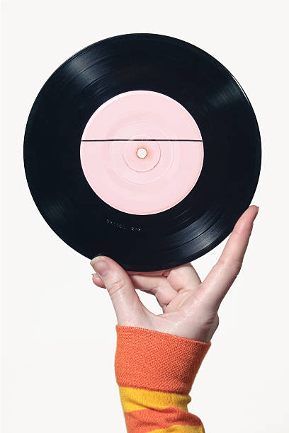 istock Vinyl Record in women hand 147306990