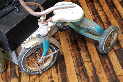 Old blue tricycle at the antique stores