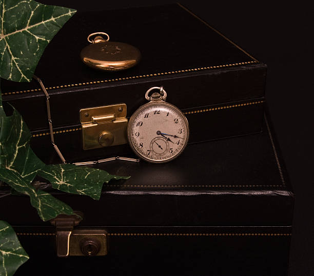 Two pocket watches and boxes stock photo