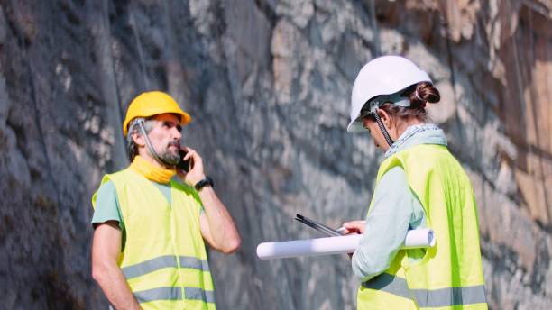 istock Road engineers work on the building of highways. 1473078168