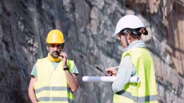 istock Road engineers work on the building of highways. 1473078186
