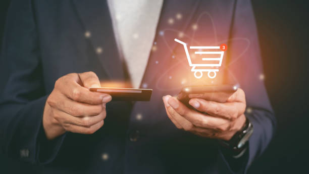 istock Male hand using smartphone to make online payment by credit card 1473082643