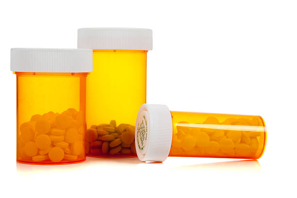 istock Assorted Medical Presription bottle on white 147308459