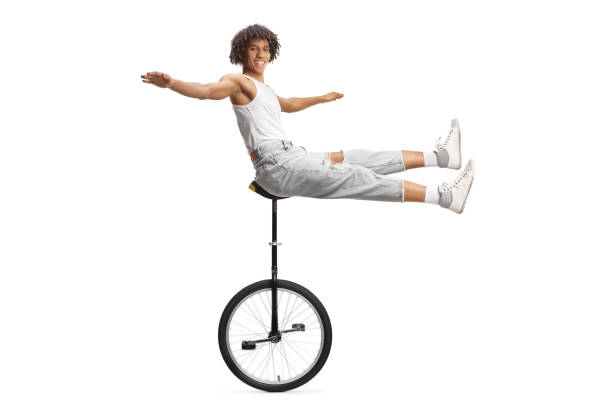 woman through the city with the unicycle to go to work