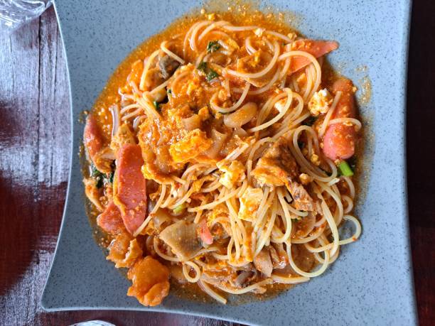 Seblak Chicken Spaghetti Sausage is Malakan from Indonesia which tastes very delicious stock photo
