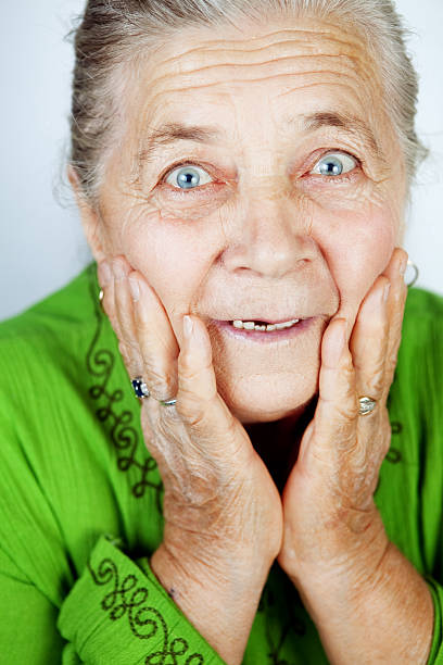 istock Excited senior woman with surprise expression 147308599