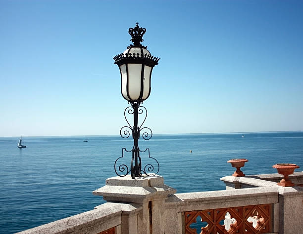 istock Beautiful lamp on Miramare castle overlooking the sea 147308782