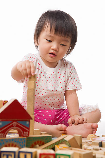 istock Little Asian girl playing 147309456