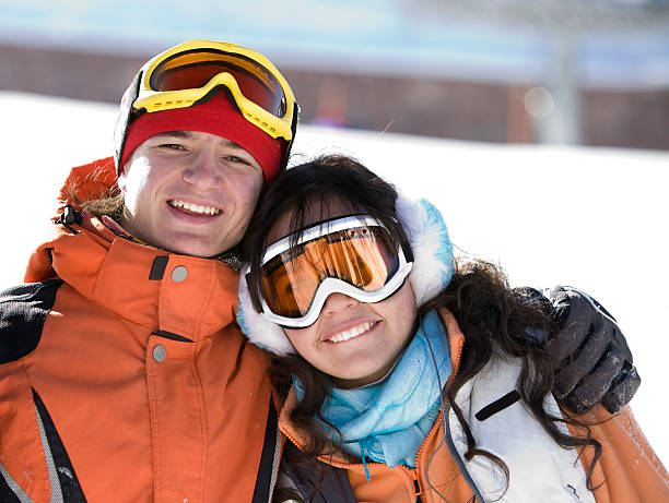 istock Lucky couple  snowboarders  in a mountain 147309563