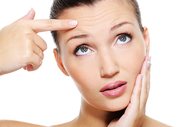 istock woman showing  the wrinkles 147309974