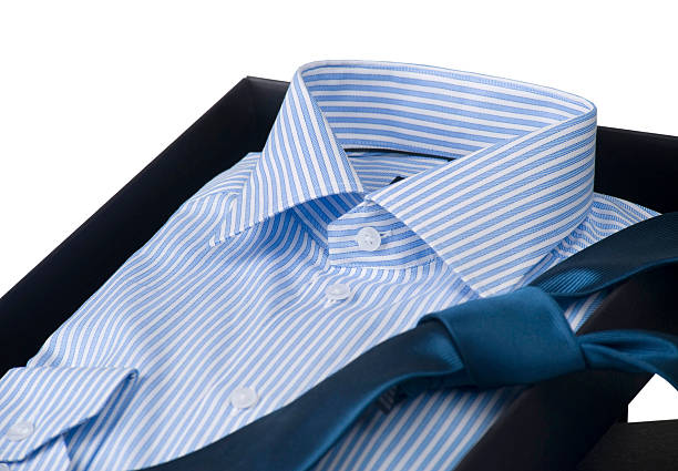 man's shirt and tie in elegant gift box, isolated stock photo
