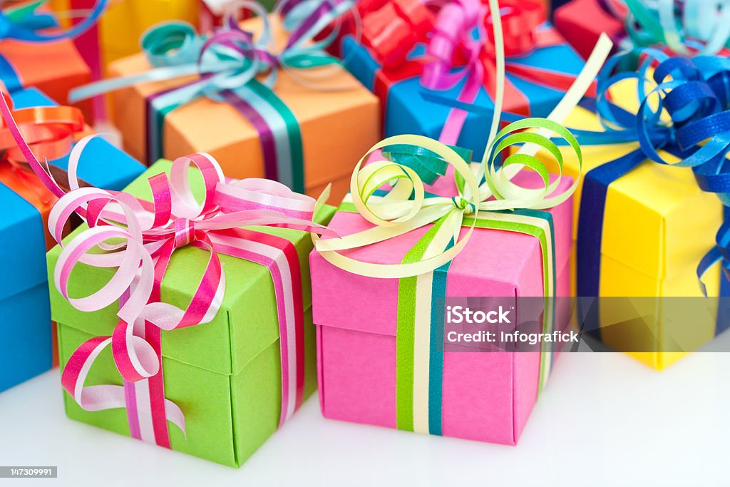 Colorful gifts box Closeup of colorful gifts box on white background Birthday Stock Photo