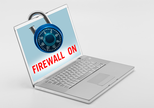 Locked laptop with “Firewall on” text on screen