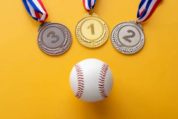 Photo of Baseball hardball and gold medal (1st place), silver medal (2nd place), bronze medal (3rd place)
