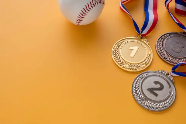 Photo of Baseball hardball and gold medal (1st place), silver medal (2nd place), bronze medal (3rd place)