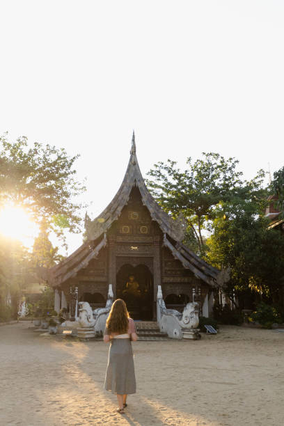 istock A woman visiting a Buddhist temple 1473104839