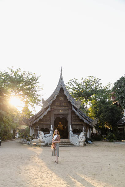 istock A woman visiting a Buddhist temple 1473104840
