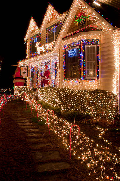 istock House with christmas lights vertical 147310533