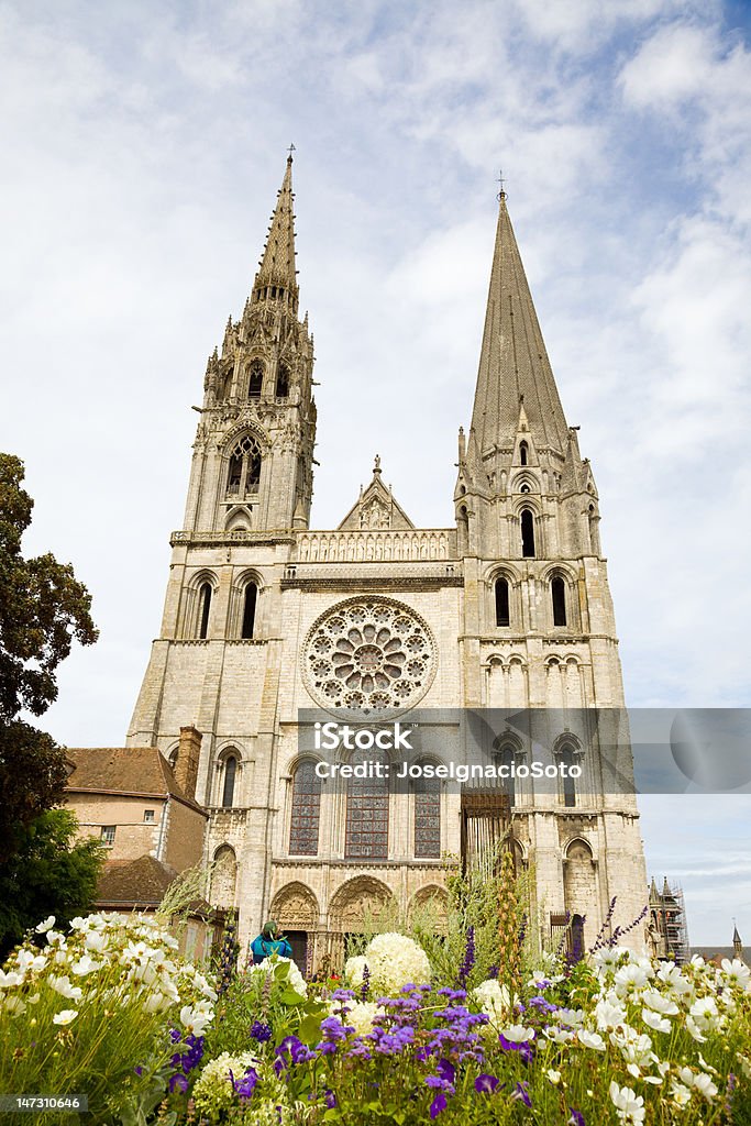 Chartes Cathedral facade Main facade of Chartres Cathedral in a cloudy day. Chartres Stock Photo