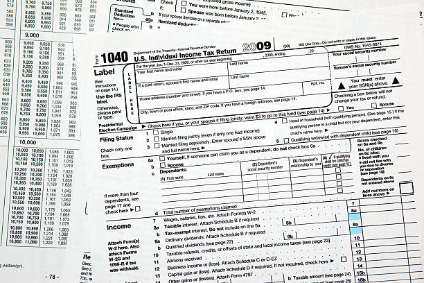 istock Tax time - Closeup of U.S. 1040 return 147310997