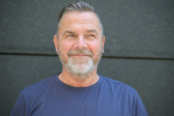 istock Happy vivacious bearded middle aged man portrait 1473112844