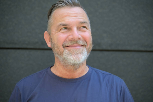istock Happy vivacious bearded middle aged man portrait 1473113180