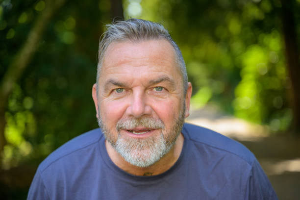 istock Intense senior man looking into the camera 1473114222
