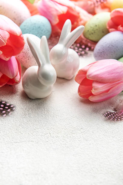 istock A bouquet of tulips, Easter bunnies and eggs. 1473116556