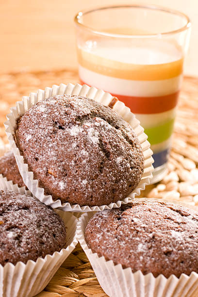 Chocolate muffins with milk stock photo